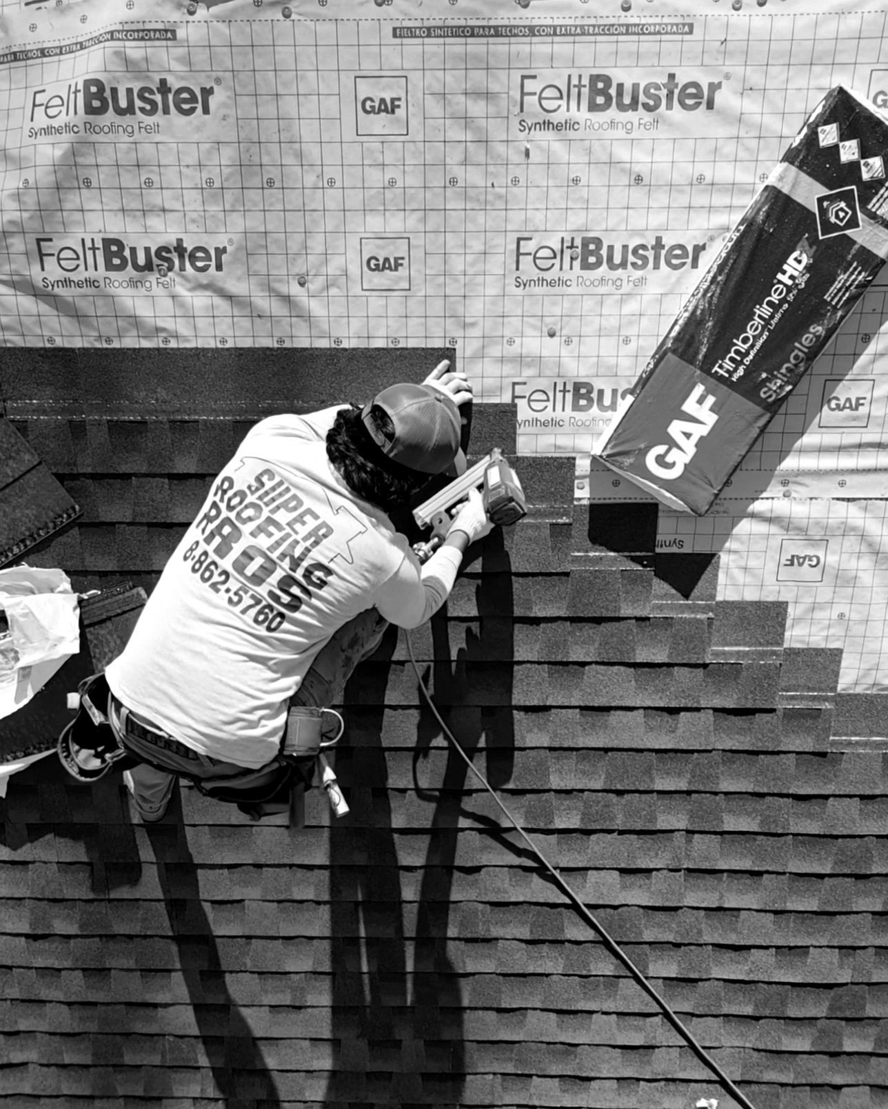 Super Roofing Pros roofer nailing shingles on a Metro Atlanta roof